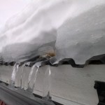 Snörasskydd plåttak - Snösmältning pågår i Kiruna Jukkasjärvi 2011-04-02