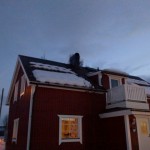 Snörasskydd plåttak - Snösmältning pågår i Kiruna Jukkasjärvi 2011-04-07